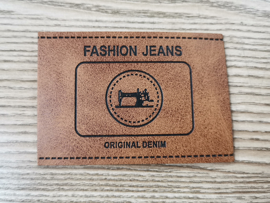 Embossed Logo PU Leather Patches Custom Color Sew On Clothing