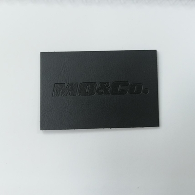 友好的な浮彫りにされたロゴのスエードのMicrofiber PUの革ラベル洗濯できるEco