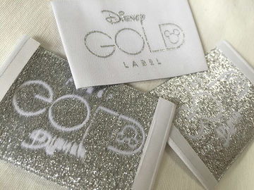 ディズニーの金のBageの端の折目によって編まれる衣類はコールド カット/熱切口を分類します