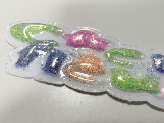 持続可能なカスタムスパークリングピンクイエローTPUパッチパフラベル 衣類用
