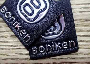 袋のための銀製の浮き出しTPUのロゴの黒の浮彫りにされた革パッチ