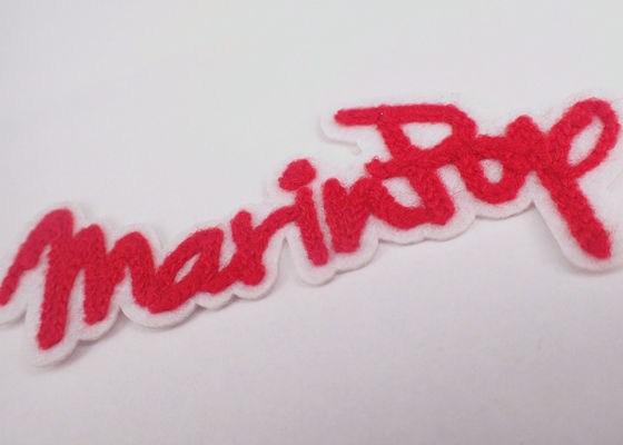 ロゴ パッチの注文タオルの刺繍のシュニールの漫画の鉄
