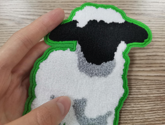 熱伝達はタオルの刺繍パッチの綿材料をカスタマイズされて分類する