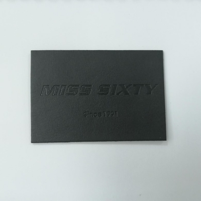 浮彫りにされたロゴのスエードのMicrofiber PUの革ラベル洗濯できる注文色